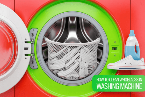 White shoelaces placed in a laundry mesh bag inside a front-load washer, with a detergent bottle and sneaker beside it