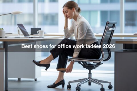 Woman in office sitting at desk removing uncomfortable heels, highlighting need for best shoes for office work ladies for all-day comfort